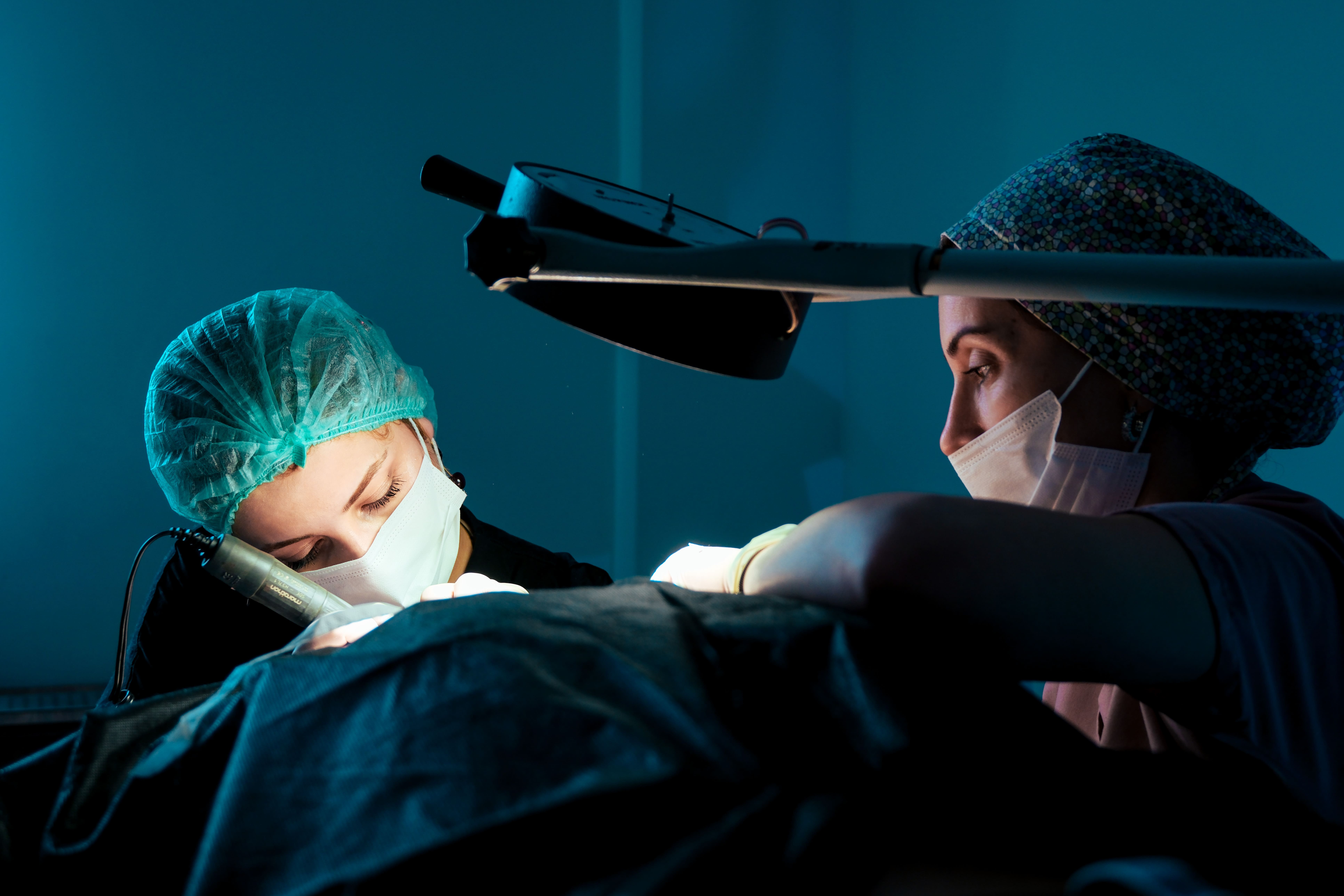 Surgical team performing shave-free procedure