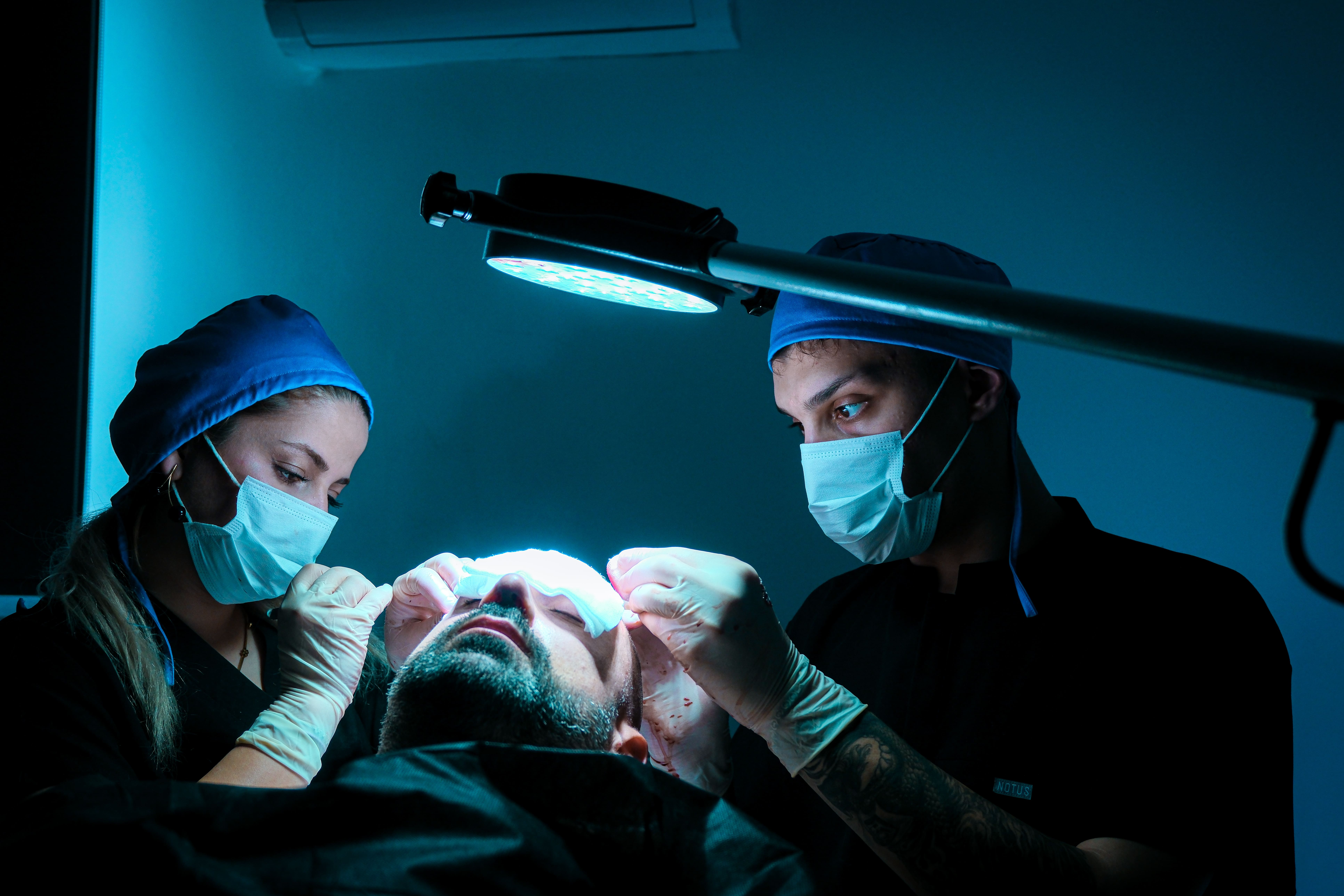 Surgical team during shave-free procedure